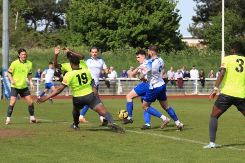 IMG 1946-Enfields-Marcus-Wyllie-shoots-between-Temi-Babalola-19-and-another-Potters-Bar-defender