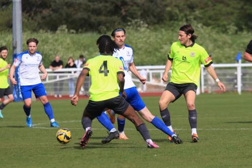 IMG 1997-Enfields-Marcus-Wyllie-10-tries-to-get-past-Dwight-Pascall