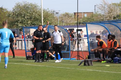 IMG 2036-All-time-Enfield-record-goalscorer-Liam-Hope-now-Potters-Bar-assistant-manager-receives-a-yellow-card