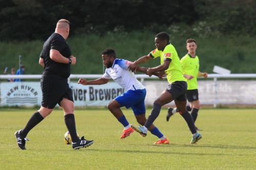 IMG 2219-Reece-Beckles-Richards-tries-to-get-clear-of-Prosper-Keto