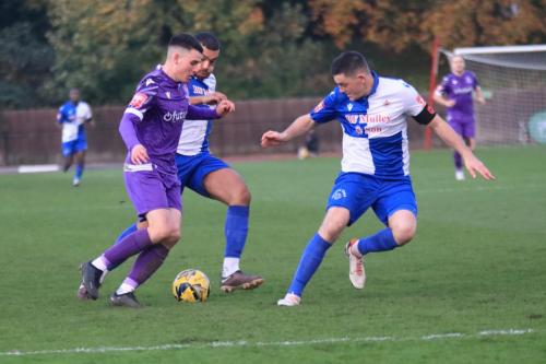 IMG 3582-Marcus-Wyllie-challenged-by-Tom-Wraight-R-and-Nathan-Bertram-Cooper