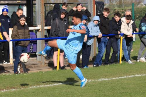 IMG 1516-Dylan-Adjei-Hersey-stretches-in-an-attempt-to-keep-the-ball-in-play