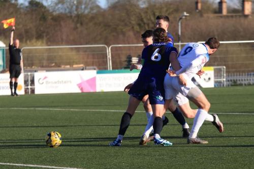 IMG 0828-The-assistant-referee-flags-for-offside-but-the-players-and-referee-havent-noticed-yet