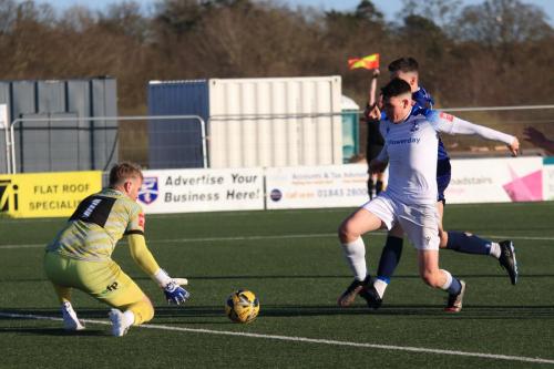 IMG 0831-Harry-Seaden-fluffs-a-simple-save-from-Marcus-Wyllie-but-his-blushes-are-spared-by-an-offside-flag