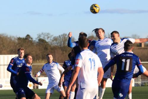 IMG 0930-Enfields-Taylor-McKenzie-R-and-Sam-youngs-challenge-for-a-header