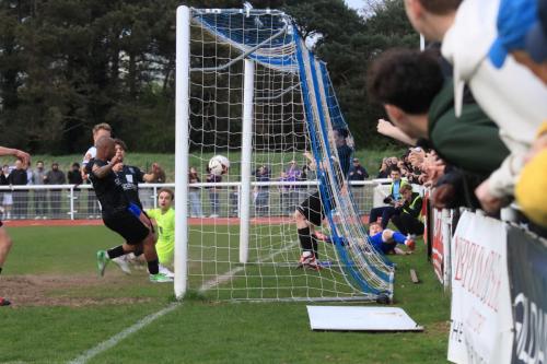 IMG 9406-Tyreke-Johnson-stops-the-ball-crossing-the-line-after-Freddie-Grants-initial-block