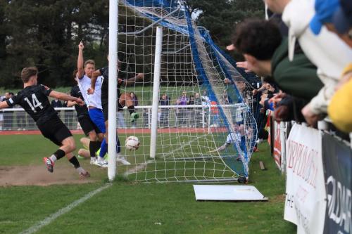 IMG 9408-Luke-Scopes-completes-the-clearance-after-blocks-from-Freddie-Grant-in-Tyreke-Johnson