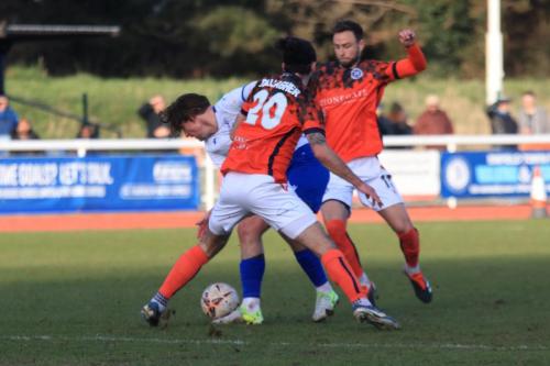 IMG 8026-Sam-Youngs-challenged-by-Dan-Gallagher-and-Josh-Taylor