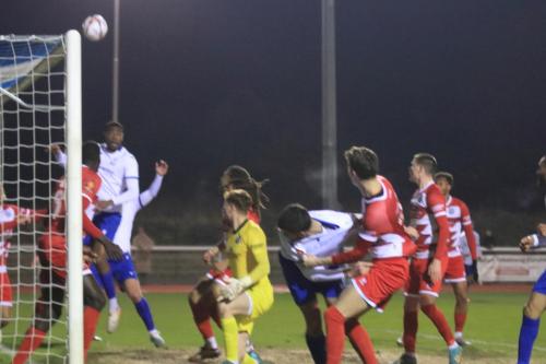 IMG 7538-Henry-Hawkins-header-is-cleared-off-the-line