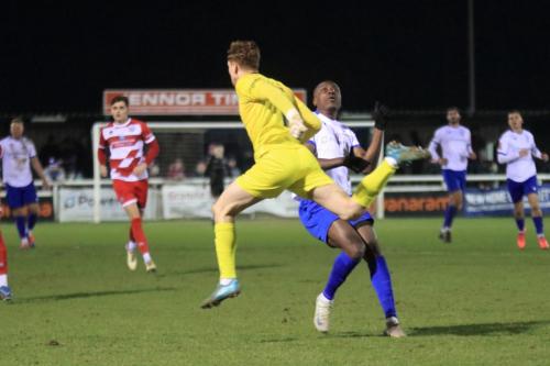 IMG 7600-Eastbourne-keeper-Joe-Wright-heads-clear-from-Anointed-Chukwu