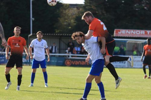 IMG 4118-Sports-Michael-Gash-heads-clear-from-Harry-Ottaway