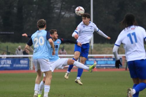 IMG 6602-Enfields-Billy-Leonard-wins-a-header-against-Elliott-Frear