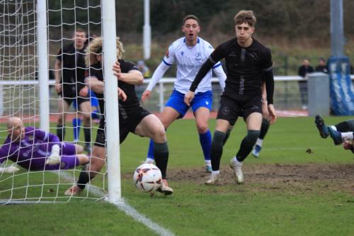 IMG 6940-Aaron-Kuhl-clears-the-rebound-after-Henry-Hawkins-hits-the-post