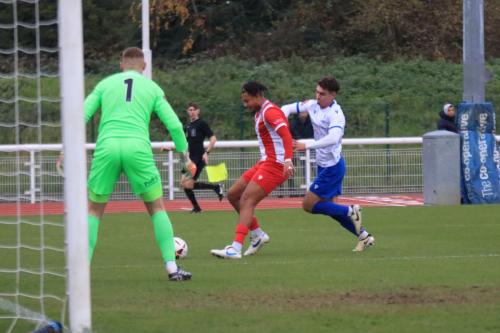 IMG 5444-Giles-Phillips-shielda-the-ball-from-Billy-Leonard