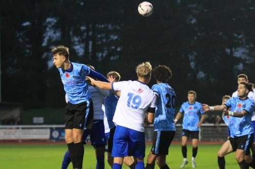 IMG 5276-Canice-Carroll-R-prepares-to-head-claer-after-Owen-Dore-L-misses-his-header