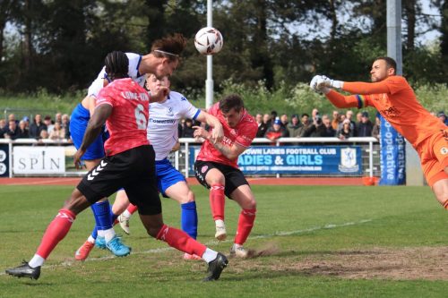 IMG 9510-Sam-Youngs-challenges-for-the-ball-as-Michael-Johnson-tries-to-punch.-Somehow-the-ball-ended-up-in-the-net-with-the-goal-credited-to-Cian-Dillon