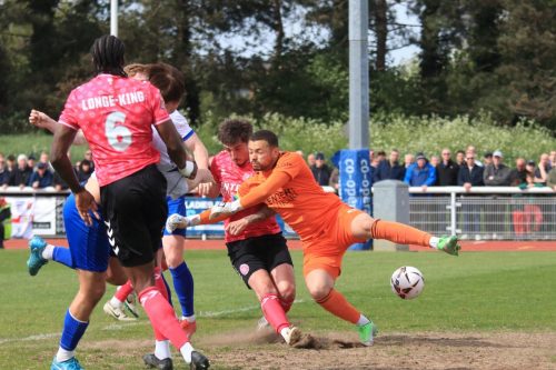 IMG 9512-Sam-Youngs-challenges-for-the-ball-as-Michael-Johnson-tries-to-punch.-Somehow-the-ball-ended-up-in-the-net-with-the-goal-credited-to-Cian-Dillon