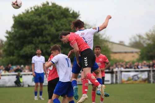 IMG 9707-Sam-Youngs-wins-a-header-against-James-Sweet
