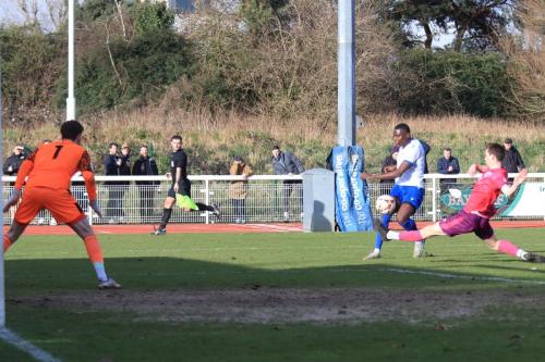 IMG 7751-Anointed-Chukwu-crosses-to-sert-up-the-Enfield-goal-for-Hisham-Kasimu