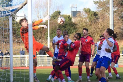 IMG 7793-Matthew-Rowley-is-almost-beaten-by-an-inswingng-corner-but-mangaes-to-scramble-the-ball-away