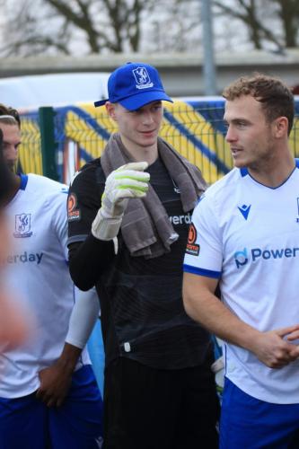 IMG 5968-Enfield-keeper-Rhys-Forster-is-prepared-for-the-low-sun-at-the-start-of-the-game