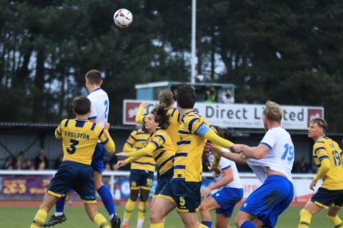 IMG 6048-Dan-Cox-2-heads-the-ball-across-goal