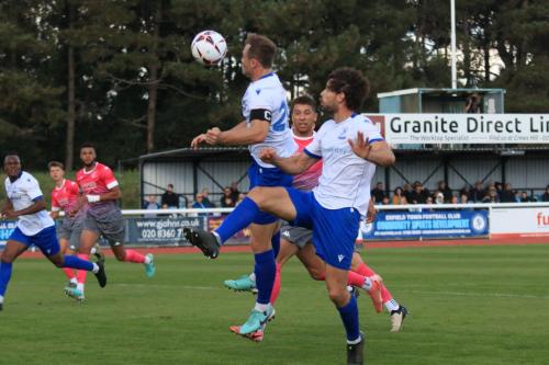 IMG 4336-Enfield-captain-Mickey-Parcell-beats-team-mate-Harry-Ottaway-to-a-cross-but-heads-wide