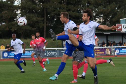 IMG 4337-Enfield-captain-Mickey-Parcell-beats-team-mate-Harry-Ottaway-to-a-cross-but-heads-wide