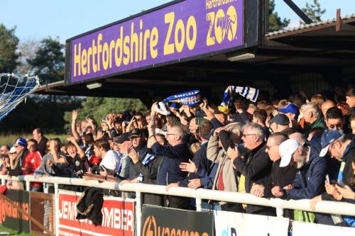 IMG 4505-Enfield-fans-celebrate-at-the-final-whistle-Manager-Gavin-Macpherson-leads-the-applause-after-the-game