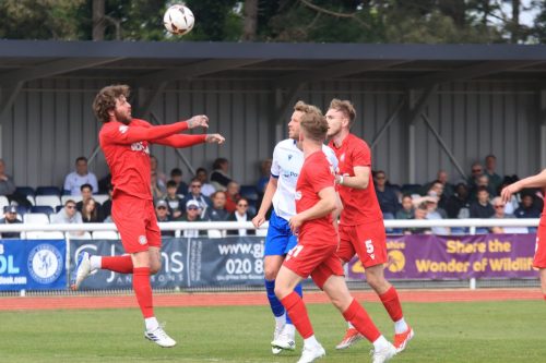 IMG 9937-Glen-Rea-heads-clear-from-Adam-Thompson