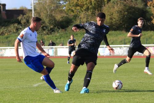 IMG 4651-Jake-Hutchinson-squares-the-ball-past-Brooklyn-Kabongolo-but-can-only-find-Harry-Beadle