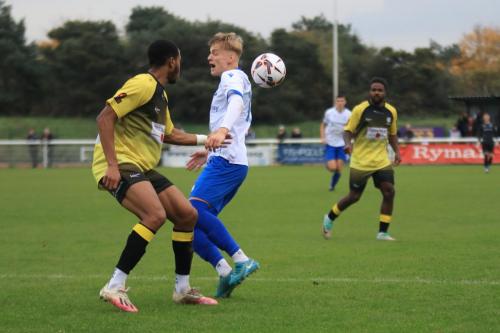 IMG 4998-Cheshams-Avan-Jones-was-adjudged-to-have-handled-the-ball-under-pressure-from-Harley-Mills