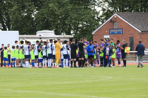 IMG 3443-The-teams-provide-a-guard-of-honour-for-Enfield-Towns-Disability-XI