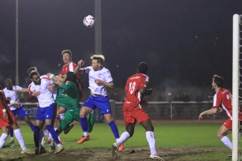 IMG 7175-Welling-keeper-Rhys-Lovett-misses-a-punch.-The-officials-missed-the-arm-across-his-throat