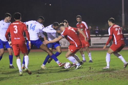 IMG 7243-Bayley-Brown-14-and-Hisham-Kasimu-challenge-Dave-Winfield-for-a-loose-ball