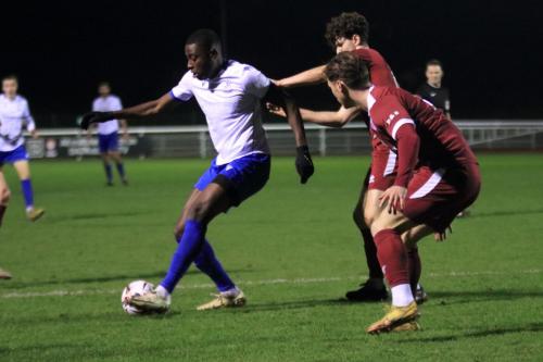 IMG 6465-Anointed-Chukwu-shields-the-ball-from-Arthur-Penney-rear-and-Cameron-James
