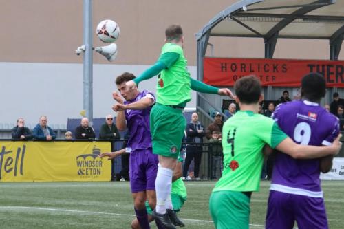 IMG 9011-Sloughs-Scott-Davies-heads-clear-from-Billy-Leonard