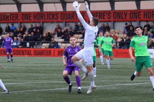 IMG 9161-Charlie-Horlock-collects-a-cross-ahead-of-Nathan-Tormey