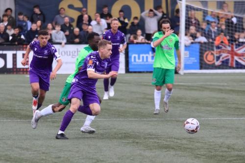 IMG 9183-Enfields-Natham-Tormey-in-a-race-for-possession-with-Henry-Ochieng