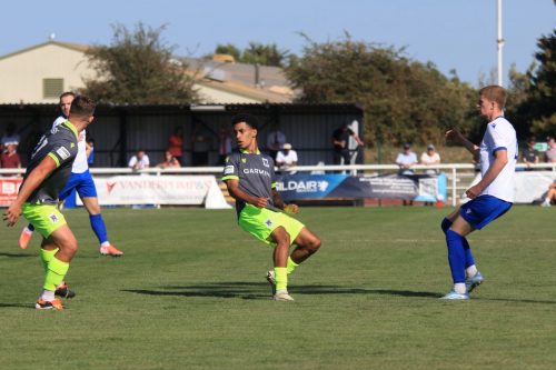 IMG 0826-Hayden-Bullas-R-crosses-past-Declan-Rose-L-and-Ashley-Clarke