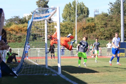 IMG 0878-Ryan-Gosney-tips-a-header-from-Sam-Youngs-over-the-bat