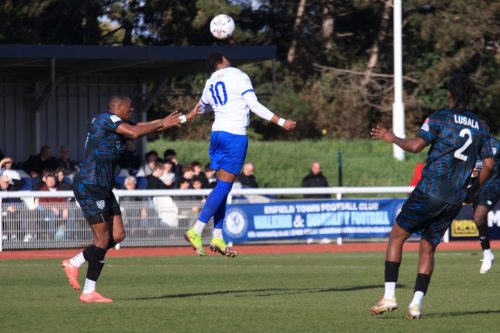 IMG 4539-Lamar-Reynolds-wins-a-header-against-Paul-Kalambayi