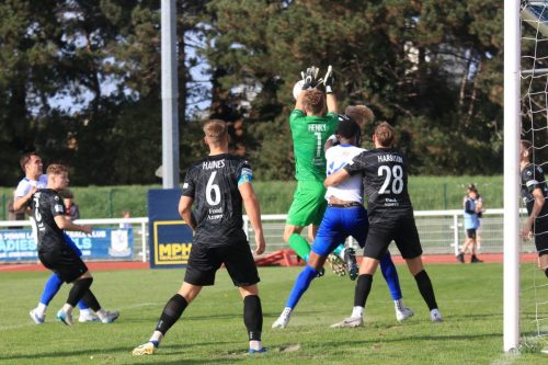 IMG 1550-Will-Henry-fumbles-a-cross-but-is-able-to-grab-the-rebound