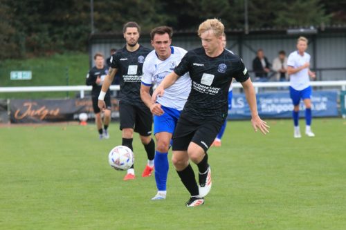 IMG 1654-Dan-Ellison-R-clears-from-Tommy-Wood