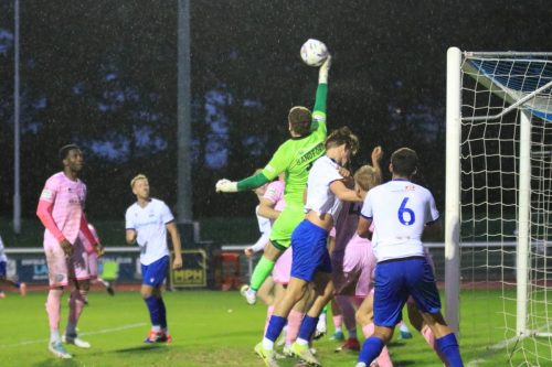 IMG 2612-Eastbournes-Ryan-Sandford-palms-the-ball-clear