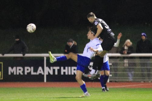 IMG 4329-Luis-Fernandez-heads-clear-from-Sam-Youngs