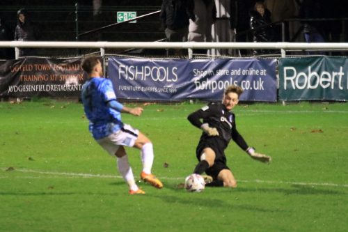 IMG 2893-After-an-initial-slip-Tom-Norcott-recovers-to-beat-Matty-Taylor-to-the-ball