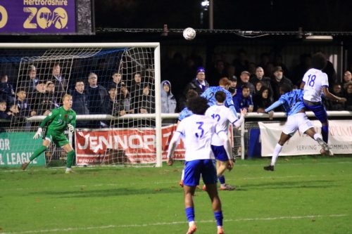 IMG 2931-Eli-Ackason-18-wins-a-header-against-Dom-Revan