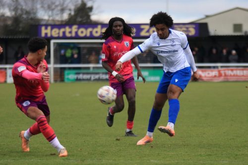 IMG 3444-Nino-Adom-Malaki-crosses-as-Kykle-Smith-tries-to-block