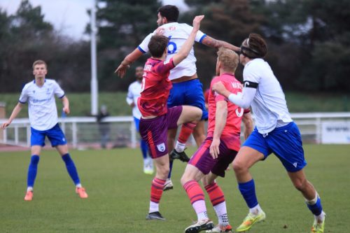 IMG 3503-Enfields-Henry-Hawkins-wins-a-header-against-Ethan-Sutcliffe
